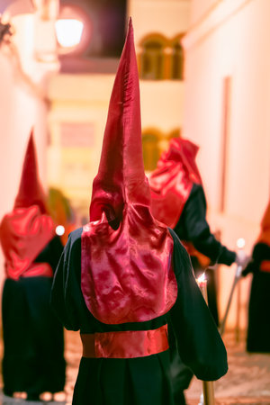 Back view of a nazareno in a holy week processionの写真素材