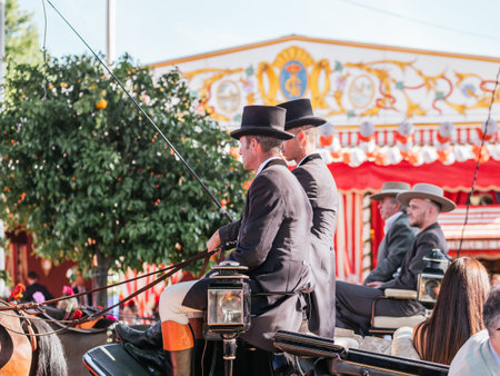 Horse drawn carriages at the April Fair Seville Fair, Feria de Sevilla, Andalusia, Spainのeditorial素材