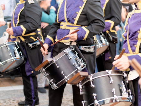 Close up of musician playing snare drum in traditional processional band