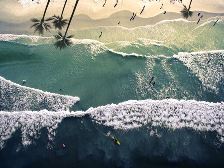 Top view aerial photograph of waves in New Smyrna Beach, Florida.の写真素材
