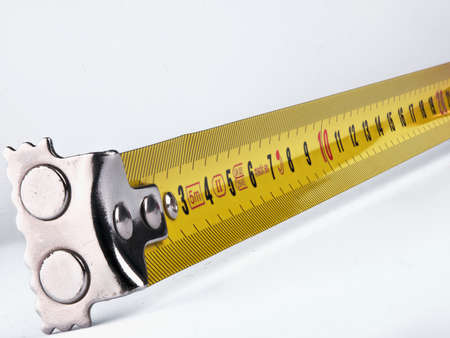 Metal measure tape isolated on white background.の写真素材