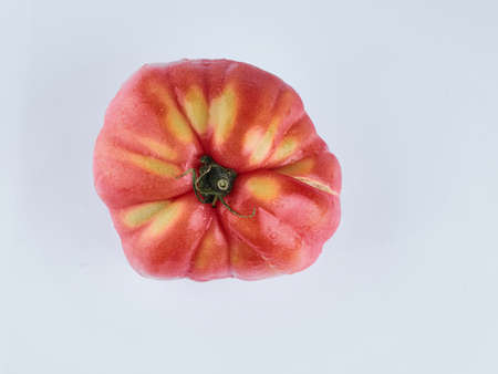 red tomato isolate. Tomato on white background. Tomato top view.の写真素材