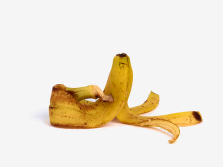 Minimalism fruit concept. Banana skin on white background. Side viewの写真素材