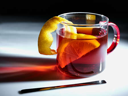 red tea with lemon skin and sliceの写真素材