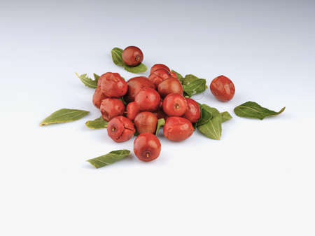 jujube fruits on white background green leavesの写真素材