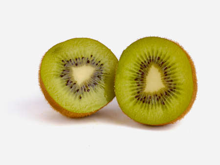 Ripe whole kiwi fruit isolated on white backgroundの写真素材