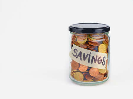 Concept of saving money. Euro coins. Glass bottle.の写真素材