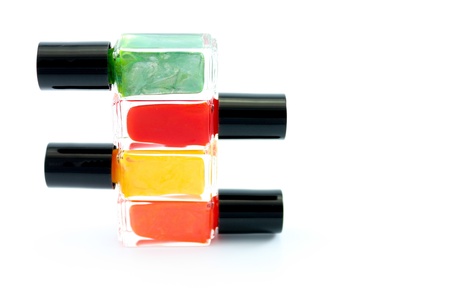 Nail polish arrangement of 4 bottles in different shades