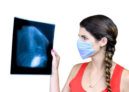Female Medical Student  examining an x-ray image