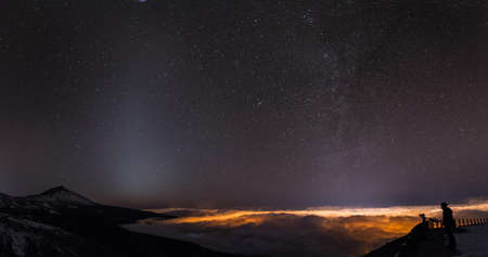 beach and mountain night scene where you can see the stars and the milky way