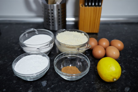 General plan of the ingredients needed to make a homemade cake on the kitchen countertopの写真素材