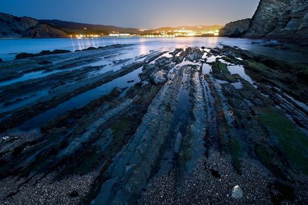 Flysch in Barrika's beach getting dark, Bizkaia (Spain)