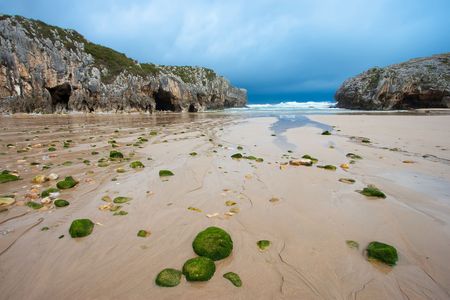 Beach of Cuevas del Mar, Nueva de Llanes, Asturias, Spainの写真素材