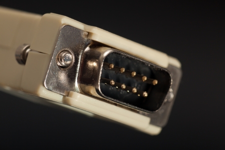 Computer plug on black background