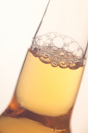 Beer bottle in white backgroundの写真素材