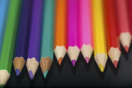 Colour pencils isolated on black の写真素材