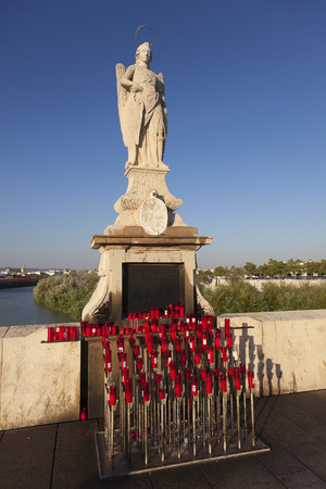 Virgin in the Roman Bridge of Cordoba, Andalucia, Spainの写真素材