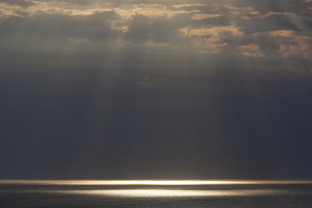 Rays of Sunlight in Etretat, Cote d'Albatre, Pays de Caux, Seine-Maritime department, Upper Normandy region, Franceの写真素材