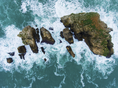 Islands in Costa Quebrada, Liencres, Cantabria, Spain