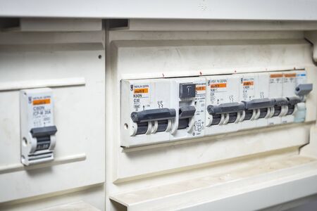 Switches in electrical fusebox. Power control panel.の写真素材