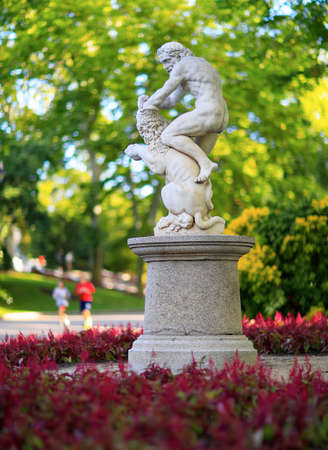 Madrid, Spain - June 16, 2020: Sculpture of Hercules and the Nemean lion in the Retiro park in Madrid.のeditorial素材