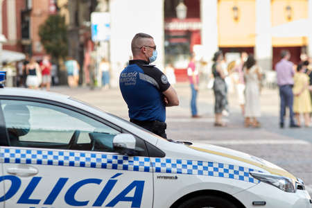 Madrid, Spain - August 8, 2020: Municipal police patrols during the Covid-19 pandemic