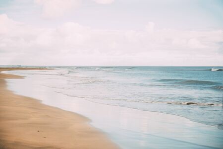 Desert beach with calm sea. Copy space.Concept of summerの写真素材