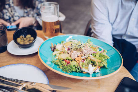 Friendly and healthy meal in a bar. Celebrations conceptの写真素材