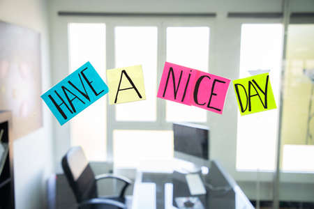 Motivational words in a modern work office.Good work environment among coworkers concept.