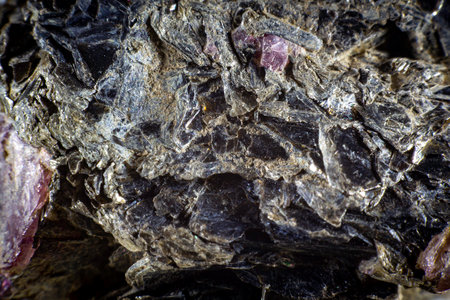 Close up on a black biotite mineral.