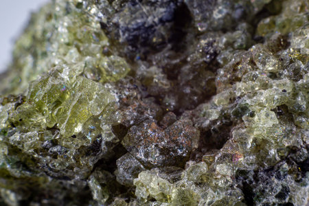 Close up on a green olivine mineral.の写真素材