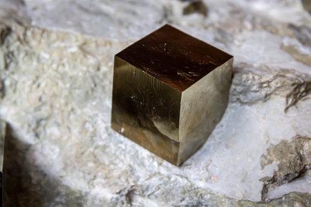 Close up on a golden pyrite mineral stoneの写真素材