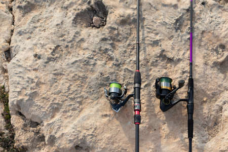 fishing rod in a lakeの写真素材