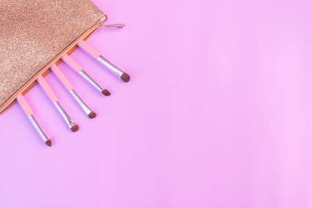 Makeup brushes on purple backgroundの写真素材