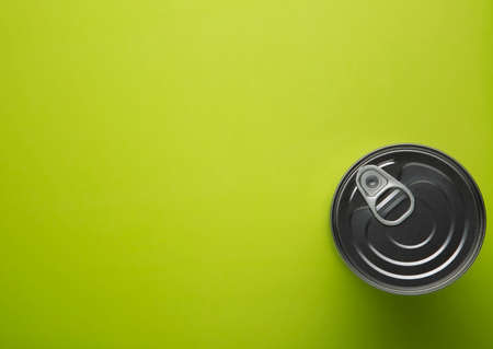 Tin can viewed from above on color backgroundの写真素材