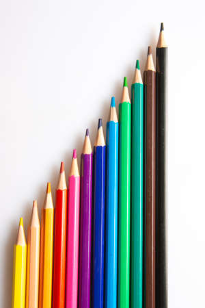 Wooden pencils of different colors on white backgroundの写真素材