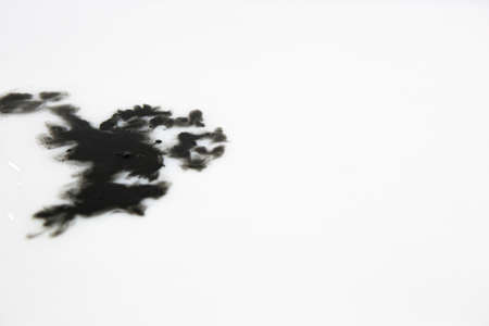 Black ink texture on white color surfaceの写真素材