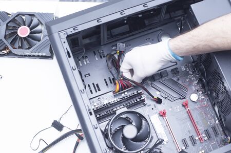 new cpu is being mounted unto the motherboard. Installing Memory Ram slots, microprocessor and...