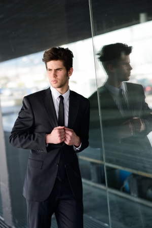 Portrait of an attractive young businessman in urban backgroundの写真素材