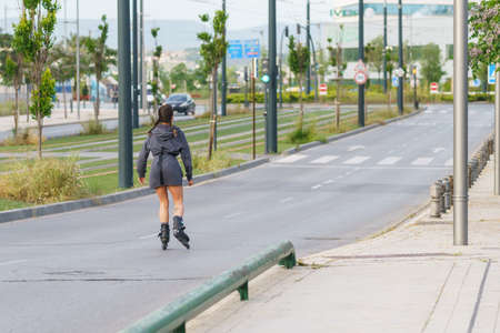 Young girl skating in the street at the end of the period of compulsory confinementのeditorial素材