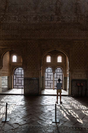 Girl enjoying the light of the Alhambra in Granada.の写真素材