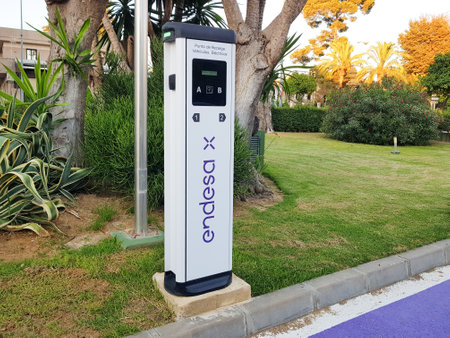 Jerez de la Frontera, Andalusia, Spain. 7 July 2021. Charging point for electric vehicles of the Endesa company located on the street.のeditorial素材