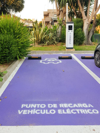 Jerez de la Frontera, Andalusia, Spain. 7 July 2021. Charging point for electric vehicles of the Endesa company located on the street.のeditorial素材