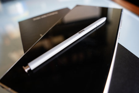 Granada, Andalusia, Spain, 25th January 2024: New Samsung S24, Ultra smartphone with its box. S-Pen on screen. Illustrative editorial photographyのeditorial素材