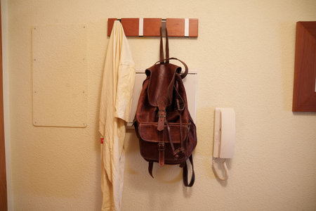 Resilient compact home with everyday essentials nearby, Intimate apartment entrance showcasing daily life paraphernalia and tranquil atmosphereの写真素材