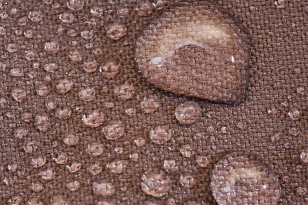 Water drops in a waterproof clothの写真素材