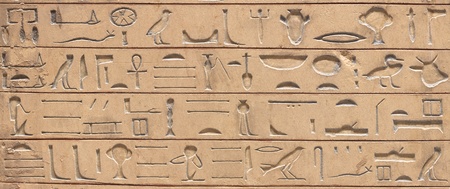 Ancient egyptian hieroglyphics carved in the stoneの写真素材
