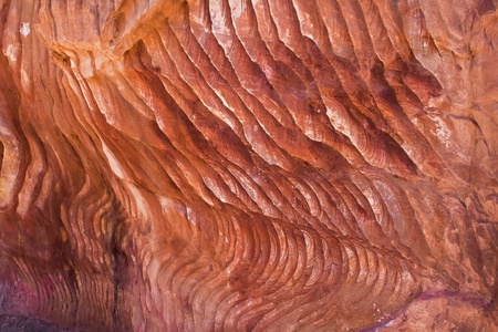 Detail of an abstract and layered sandstone wall in Petra, Jordanの写真素材
