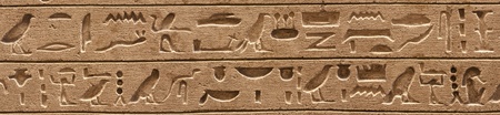 Ancient egyptian hieroglyphics carved in the stone