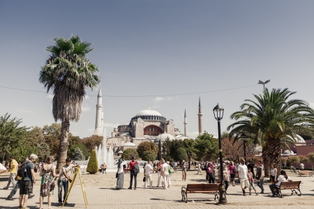 ISTANBUL - SEPTEMBER 4: Tourists in Hagia Sophia on September 4, 2012 in Istanbul, Turkey. Hagia Sophia is a former Orthodox patriarchal basilica, later a mosque and now a museum.のeditorial素材